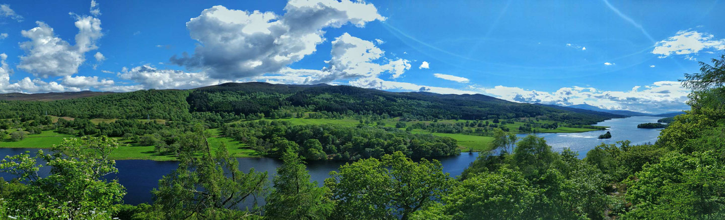 Looking down at Loch Tummel from the tree-line banks
